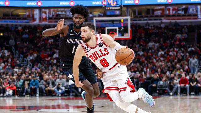 Feb 13, 2023; Chicago, Illinois, USA; Chicago Bulls guard Zach LaVine (8) drives to the basket against Orlando Magic forward Jonathan Isaac (1) during the first half at United Center.
